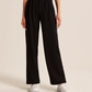 Pantalon taille haute à jambes larges et coupe ajustée