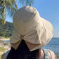 👒🔥 PROMO -50% ! Chapeau de Soleil Femme Larges Bords – Protection 360° Visage Oreilles Cou, Tissu Respirant Premium Doux Peau, Flexible Enroulable Voyage, Nœud Ruban Élégant · 3 Coloris · 55-57cm ✨