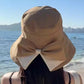 👒🔥 PROMO -50% ! Chapeau de Soleil Femme Larges Bords – Protection 360° Visage Oreilles Cou, Tissu Respirant Premium Doux Peau, Flexible Enroulable Voyage, Nœud Ruban Élégant · 3 Coloris · 55-57cm ✨