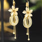Boucles d'Oreilles Pendantes Élégantes à Fleurs et Pompons