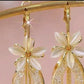 Boucles d'Oreilles Pendantes Élégantes à Fleurs et Pompons